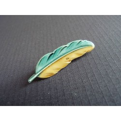 Petite broche plume d'oiseau en métal