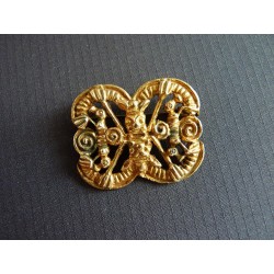 Broche tribale dorée