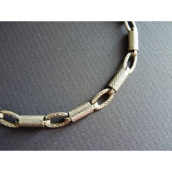 Bracelet en perles tubulaires de métal martelé